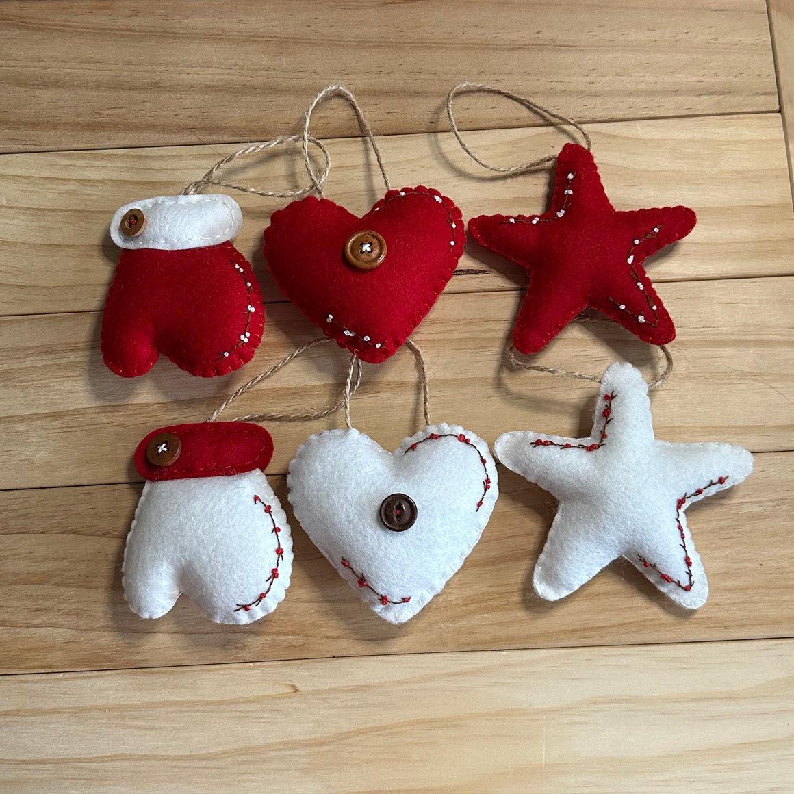 Set of six wool ornaments embroidered with berries. Stars, Hearts and Mittens. 